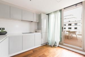 Kuchnia lub aneks kuchenny w obiekcie Gran View Apartments