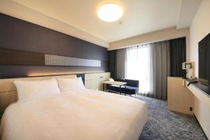Ένα ή περισσότερα κρεβάτια σε δωμάτιο στο Keisei Richmond Hotel Tokyo Monzennakacho