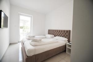 Posteľ alebo postele v izbe v ubytovaní Villa San Antonio
