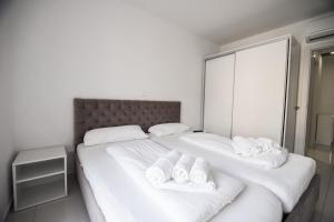 Posteľ alebo postele v izbe v ubytovaní Villa San Antonio