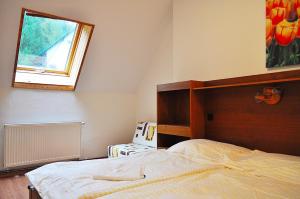 Postel nebo postele na pokoji v ubytování PH Apartments Harrachov - Rýžoviště