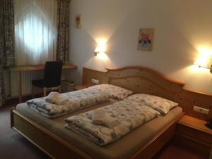Postel nebo postele na pokoji v ubytování Landhaus Paradies Samnaun Spiss