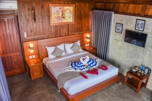 Postel nebo postele na pokoji v ubytování Japa Guesthouse
