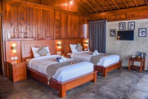 Postel nebo postele na pokoji v ubytování Japa Guesthouse