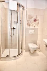 Koupelna v ubytování Hotel Komfort