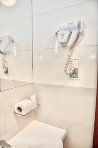 Koupelna v ubytování Hotel Komfort