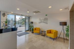 Χώρος καθιστικού στο Hotel Pax