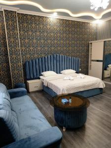 Postel nebo postele na pokoji v ubytování Hotel Felisa Gyumri