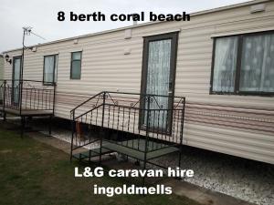 an lgc caravan fire equipments on the side of a mobile home at L&g FAMILY HOLIDAYS 8 BERTH CORAL BEACH JOHN FAMILYS ONLY AND LEAD PERSON MUST BE OVER 30 in Ingoldmells