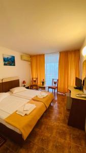 Postel nebo postele na pokoji v ubytování Hotel Cerna