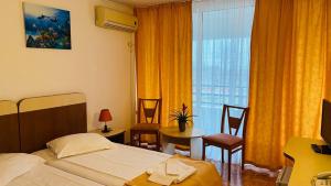 Postel nebo postele na pokoji v ubytování Hotel Cerna
