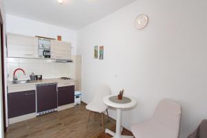 Kuchyňa alebo kuchynka v ubytovaní Apartment Gabriel