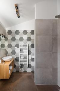 a bathroom with a sink and a mirror at Villa Edoardo by Villas Holiday in Vižinada