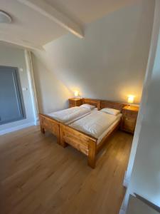 Posteľ alebo postele v izbe v ubytovaní Apartmán Na statku