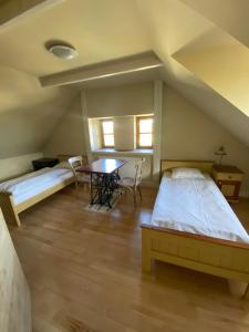 Posteľ alebo postele v izbe v ubytovaní Apartmán Na statku