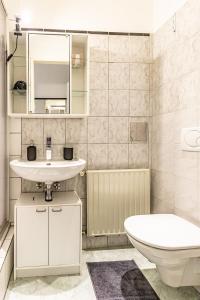A bathroom at COZY + TRENDY by JR City Apartments