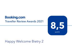 アビジャンにあるHappy Welcome Bietry 2の歓迎誕生日の青い八番の看板