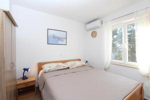 Posteľ alebo postele v izbe v ubytovaní Apartment Gabriel