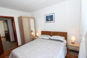 Posteľ alebo postele v izbe v ubytovaní Apartment Gabriel