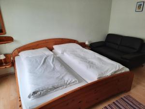 Posteľ alebo postele v izbe v ubytovaní Gasthof Haudum