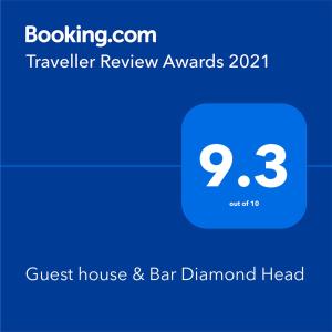 Ett certifikat, pris eller annat dokument som visas upp på Guest house & Bar Diamond Head