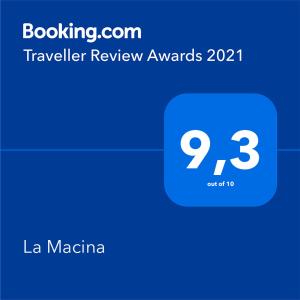 una captura de pantalla de una caja de texto con un premio de revisión de viajes en La Macina, en Cetona