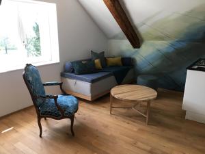 Posezení v ubytování Espace Entre Ciel & Terre