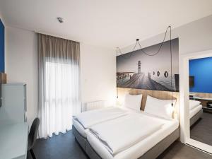 Posteľ alebo postele v izbe v ubytovaní Lakeside77