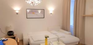 Posteľ alebo postele v izbe v ubytovaní Vienna-apartment-one Schmidgasse