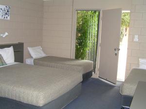 
A bed or beds in a room at Dongara Old Mill Motel
