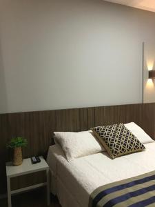 Postel nebo postele na pokoji v ubytování Hotel Requinte
