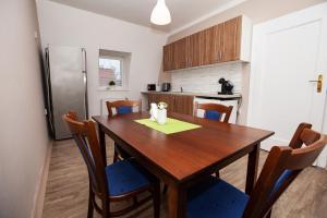Kuchyň nebo kuchyňský kout v ubytování Apartmány Rossini