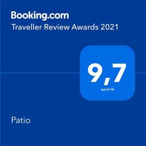 a screenshot of a cell phone with a travel review avatar at Patio in Zamora