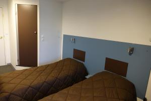 Postel nebo postele na pokoji v ubytování Fasthotel Bordeaux Eysines
