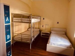 A bed or beds in a room at El cordal de laciana