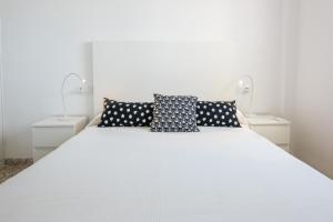 Posteľ alebo postele v izbe v ubytovaní WintowinRentals Views of Dream & Luxury Location