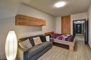 Łóżko lub łóżka w pokoju w obiekcie Apartmány Sunny Lipno