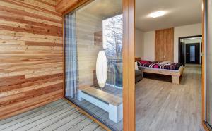 Łóżko lub łóżka w pokoju w obiekcie Apartmány Sunny Lipno
