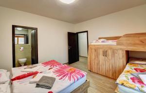 Łóżko lub łóżka w pokoju w obiekcie Apartmány Sunny Lipno