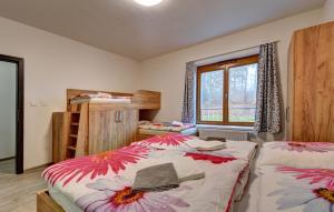 Łóżko lub łóżka w pokoju w obiekcie Apartmány Sunny Lipno