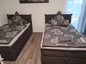 Ένα ή περισσότερα κρεβάτια σε δωμάτιο στο Ferienwohnung Andiana