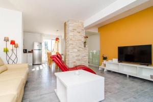 TV a/nebo společenská místnost v ubytování Apartment Lula