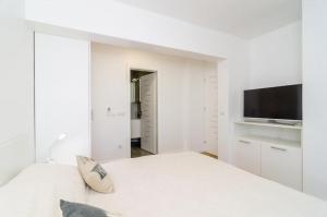 TV a/nebo společenská místnost v ubytování Apartment Lula