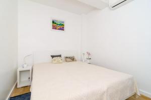 Postel nebo postele na pokoji v ubytování Apartment Lula