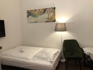 Llit o llits en una habitació de Corso Apartment