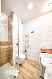 Kúpeľňa v ubytovaní Apartament 26A Willa Ogrodowa