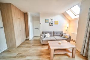 Posedenie v ubytovaní Apartament 26A Willa Ogrodowa