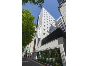a building on a city street with a building at R&B Hotel Hakata Ekimae 2 - Vacation STAY 16429v in Fukuoka