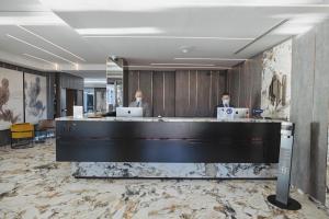 Lobbyen eller receptionen på Hotel & Resort Tre Fontane Luxury