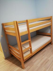 A bed or beds in a room at Wohnung Még 9 kép